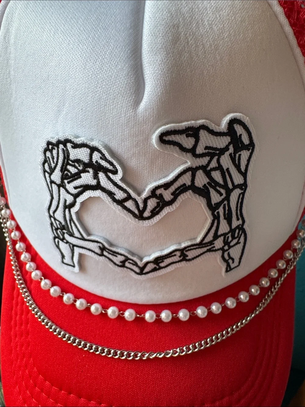 Red and White Trucker Hat with Skeleton Heart Patch